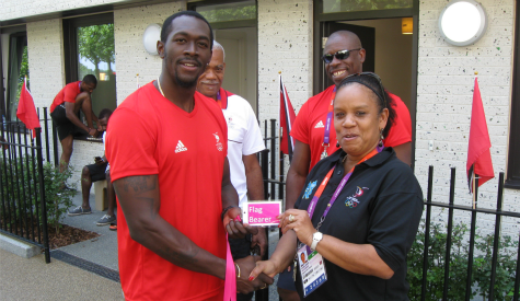 MR CONSISTENT: Trinidad and Tobago sprint star Marc Burns, left, receives his